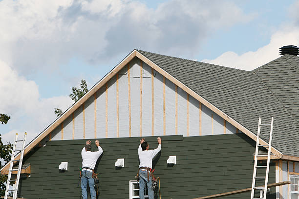 Professional Siding technician working in Poquoson, VA
